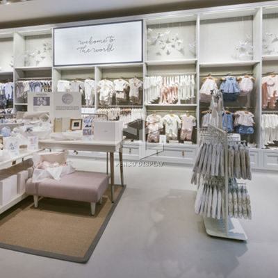 Powder Coated Attractive Clothing Display Racks Stands For Garment Store Decoration OEM